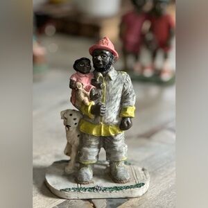 Young’s Inc African American fire fighter resin figurine